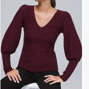 White House Black Market women’s sweater size Medium. Color is burgundy.
